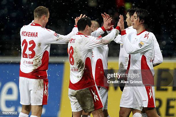 Players of Koeln celebrate after winning the Bundesliga match between Eintracht Frankfurt and 1. FC Koeln at the Commerzbank Arena on January 30,...