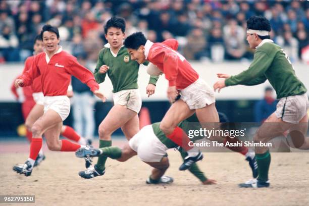 Seiji Hirao of Kobe Steel makes a break during the 26th All Japan Rugby Championship match between Kobe Steel and Daito Bunka University at the...