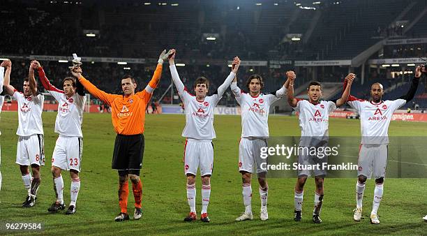 Players of Nuernberg celebrate their team's victory at the end of the Bundesliga match between Hannover 96 and FC Nuernberg at AWD-Arena on January...