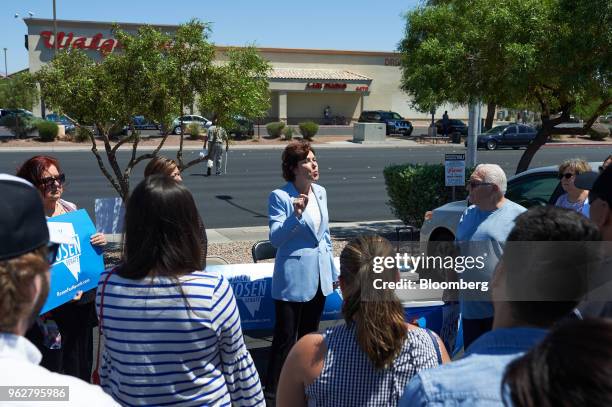 Representative Jacky Rosen, a Democrat from Nevada and Democratic U.S. Senate candidate, center, speaks ahead of early voting at Cardenas Supermarket...