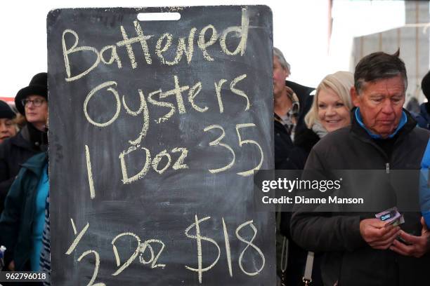 Vendors sign as seen during the Bluff Oyster & Food Festival on May 26, 2018 in Bluff, New Zealand. The annual event aims to showcase local Southland...