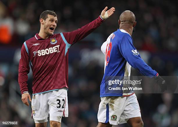 Alessandro Diamanti of West Ham United exchanges words with El Hadji Diouf of Blackburn Rovers as Diouf leaves the field after being substituted...