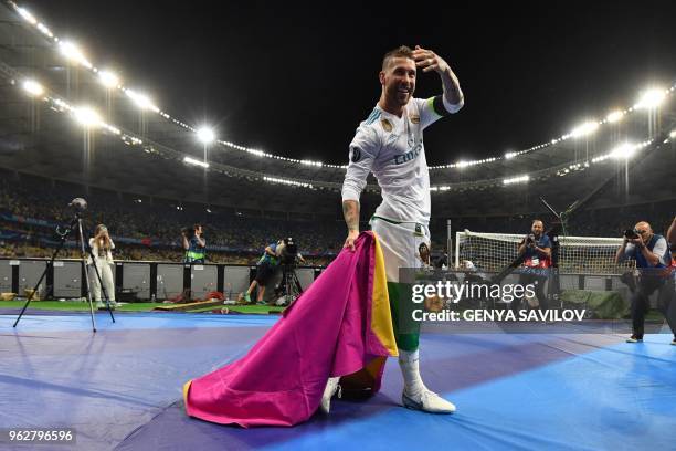 Real Madrid's Spanish defender Sergio Ramos celebrates after winning the UEFA Champions League final football match between Liverpool and Real Madrid...