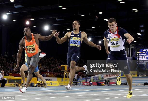 Craig Pickering of Great Britain wins the 60m ahead of Mark Jelks of USA and Harry Aikenes Aryeetey of Great Britain during the AVIVA International...