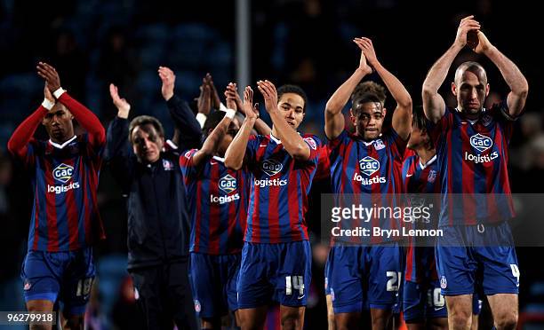 The Crystal Palace team and Manager Neil Warnock applaud their fans after winning the Coca-Cola Football League Championship match between Crystal...