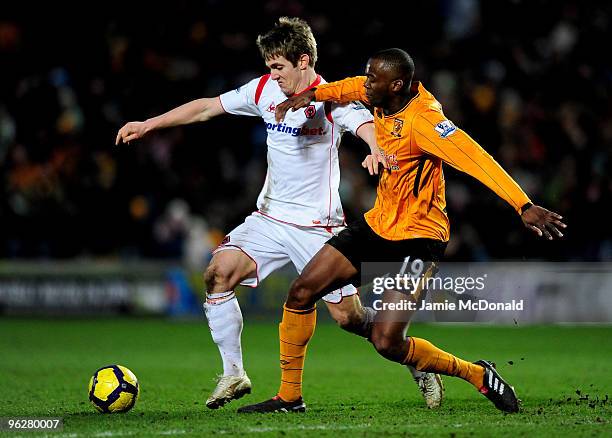 Kevin Doyle of Wolves battles with Steven Mouyokolo of Hull City during the Barclays Premier League match between Hull City and Wolverhampton...