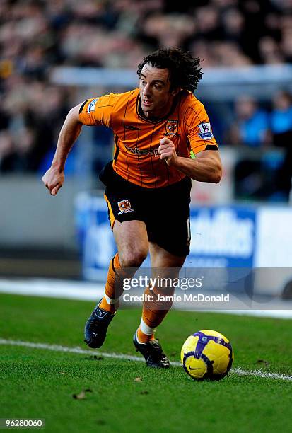 Stephen Hunt of Hull City runs with the ball during the Barclays Premier League match between Hull City and Wolverhampton Wanderers at KC Stadium on...