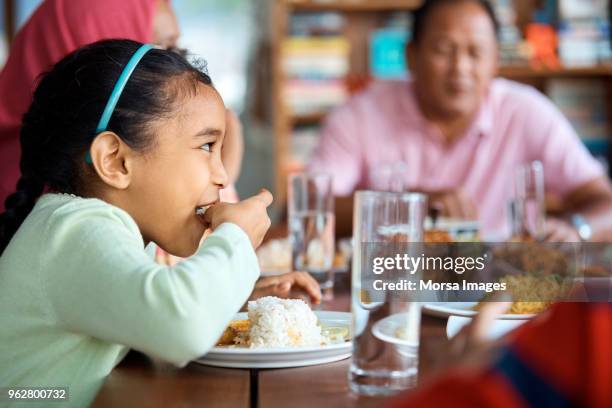 Asein Eating Rice Asian Eating Rice Photos and Premium High Res Pictures - Getty Images