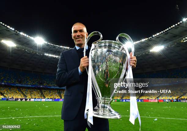 Zinedine Zidane, Manager of Real Madrid celebrates with The UEFA Champions League trophy following his sides victory in the UEFA Champions League...