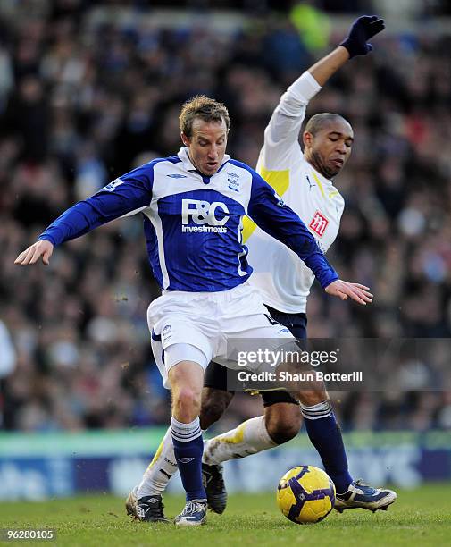 Lee Bowyer of Birmingham City is challenged by Wilson Palacios of Tottenham Hotspur during the Barclays Premier League match between Birmingham City...