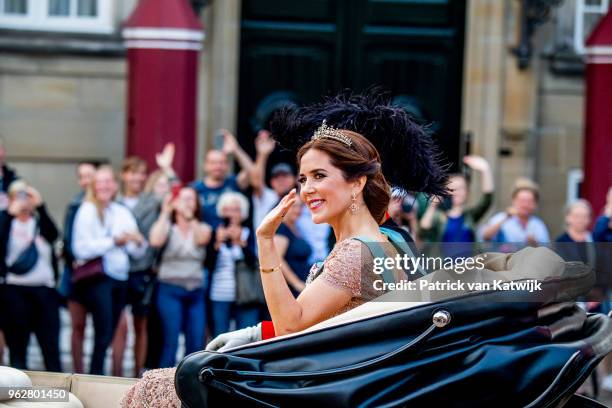Crown Prince Frederik and Crown Princess Mary during a carriage ride to the gala banquet on the occasion of The Crown Prince's 50th birthday at...