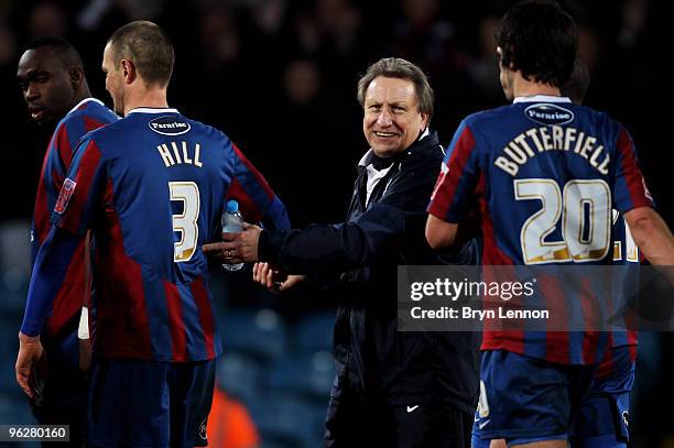 Crystal Palace Manager Neil Warnock congratulate his players after winning the Coca-Cola Football League Championship match between Crystal Palace...