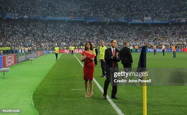 John W Henry and Linda Pizzuti Henry owners of Liverpool shows his appreciation to the fans at the end of the UEFA Champions League final between...