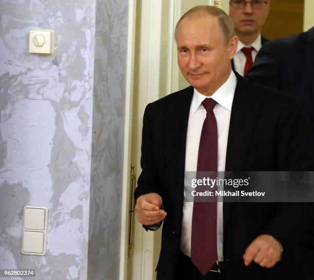 Russian President Vladimir Putin attends a meeting with foreign investors at the 2018 Saint Petersburg International Economic Forum on May 24, 2018...