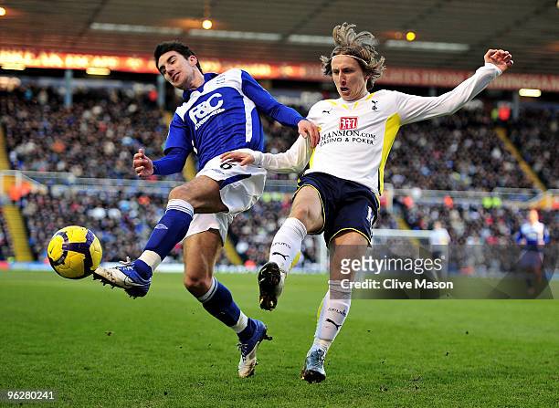 Liam Ridgewell of Birmingham in action against Luka Modric of Tottenham during the Barclays Premier League match between Birmingham City and...