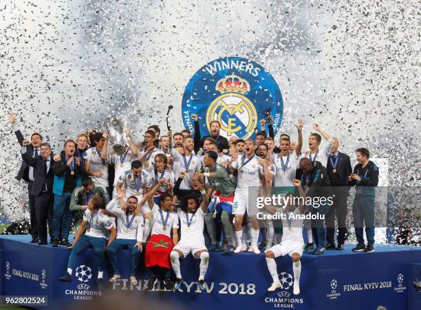 Real Madrid players celebrate the victory after winning against Liverpool FC in the UEFA Champions League final football match at the Olimpiyskiy...