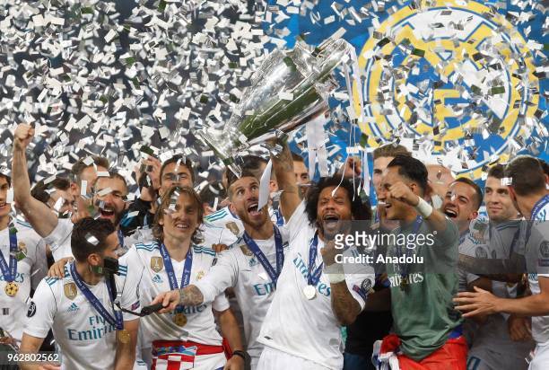 Real Madrid players celebrate the victory after winning against Liverpool FC in the UEFA Champions League final football match at the Olimpiyskiy...
