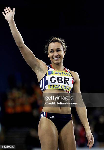 Jessica Ennis of Great Britain thanks the support in the high jump during the AVIVA International Match at Kelvin Hall on January 30, 2010 in...