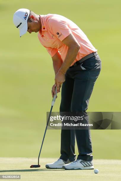 Justin Rose of England putts on the 18th green during round three of the Fort Worth Invitational at Colonial Country Club on May 26, 2018 in Fort...