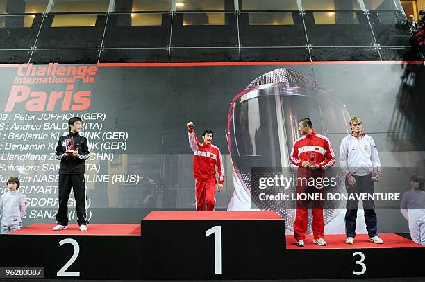 KoreanYoung Kwon , China's Sheng Lei and Liangeai Huang , Russian Alexey Khovansky , pose on the podium after the men's International Paris'...