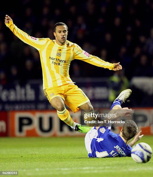 Wayne Routledge of Newcastle United upends Andy King of Leicester City during during the Coca-Cola championship match between Leicester City and...