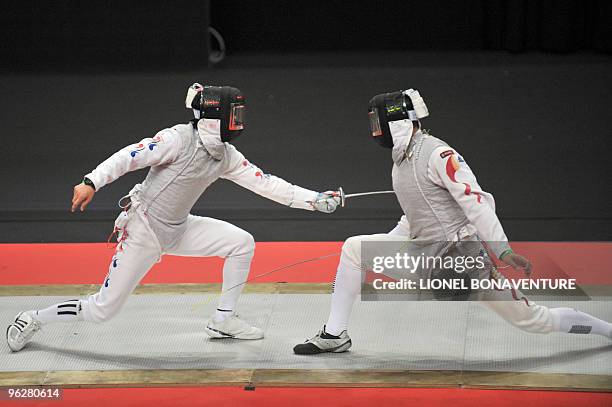 China's Liangeai Huang competes against Korea's Young Kwon during the men's International Paris' Challenge individual Epee competition on January 30,...