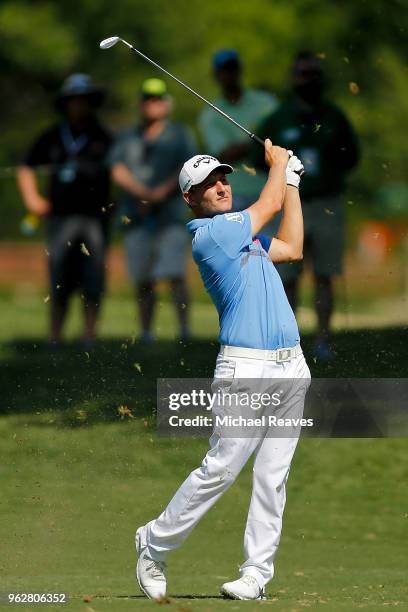 Emiliano Grillo of Argentina plays his second shot on the 17th hole during round three of the Fort Worth Invitational at Colonial Country Club on May...