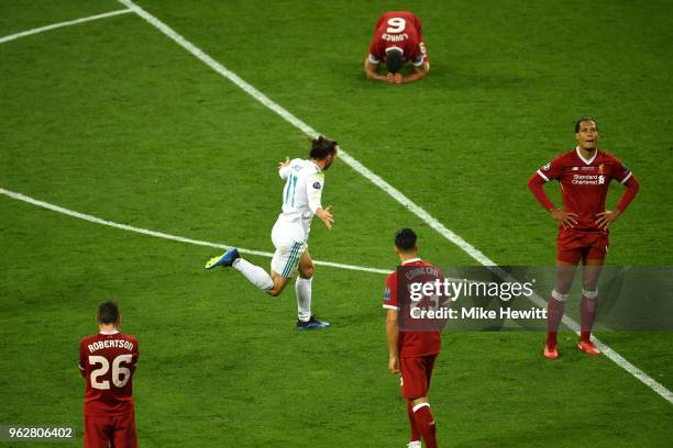 Gareth Bale of Real Madrid celebrates scoring his sides third goal during the UEFA Champions League Final between Real Madrid and Liverpool at NSC...