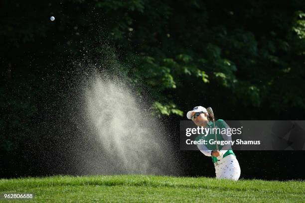 Minjee Lee of Australia hits from a bunker to the sixth green during the third round of the LPGA Volvik Championship on May 26, 2018 at Travis Pointe...