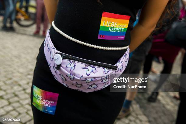 People attend a Tuntenpaziergang to protest against homophobia and for LGBTI rights and diversity in Berlin Neukoelln on May 26, 2018.