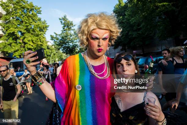 People attend a Tuntenpaziergang to protest against homophobia and for LGBTI rights and diversity in Berlin Neukoelln on May 26, 2018.