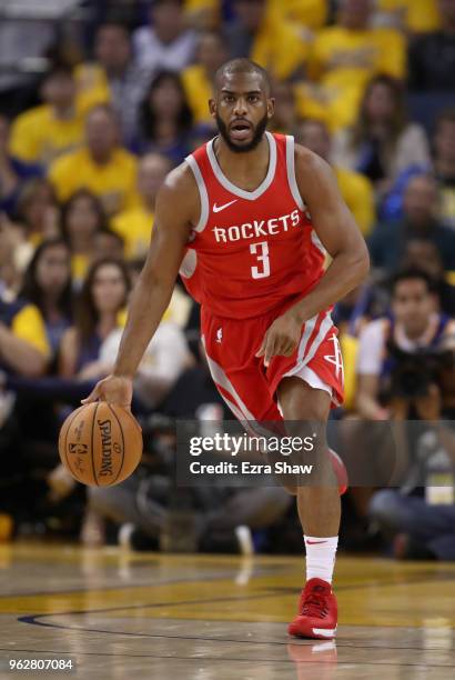 Chris Paul of the Houston Rockets in action against the Golden State Warriors during Game Three of the Western Conference Finals at ORACLE Arena on...