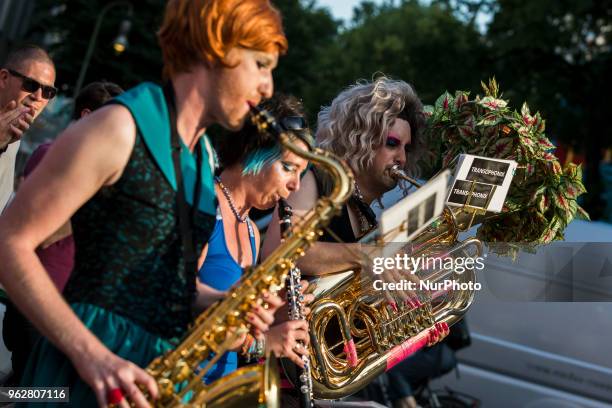 People attend a Tuntenpaziergang to protest against homophobia and for LGBTI rights and diversity in Berlin Neukoelln on May 26, 2018.