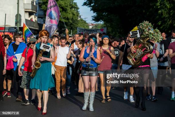 People attend a Tuntenpaziergang to protest against homophobia and for LGBTI rights and diversity in Berlin Neukoelln on May 26, 2018.