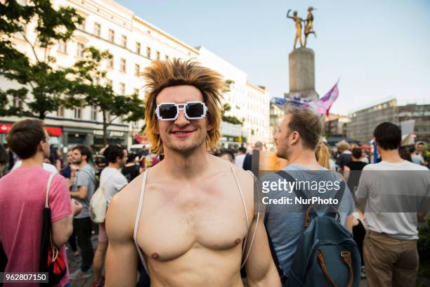People attend a Tuntenpaziergang to protest against homophobia and for LGBTI rights and diversity in Berlin Neukoelln on May 26, 2018.