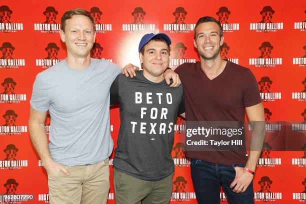 Tommy Vietor, Jon Lovett, Jon Favreau of 'Pod Save America' pose backstage during Day 2 of 2018 Boston Calling Music Festival at Harvard Athletic...