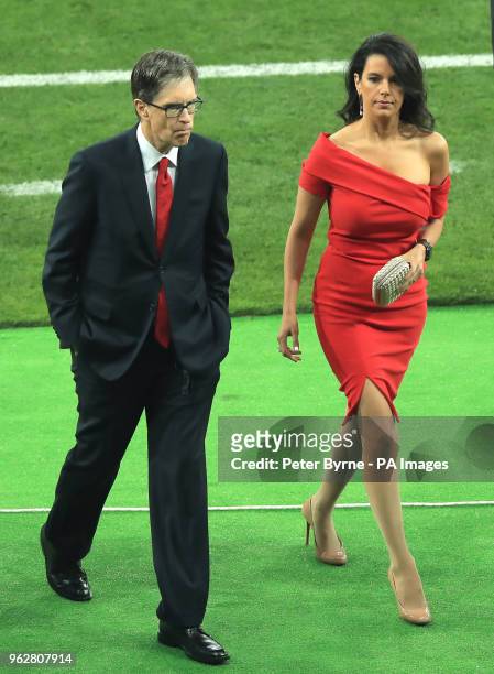 Liverpool owner John W. Henry and wife Linda Pizzuti Henry on the pitch after the UEFA Champions League Final at the NSK Olimpiyskiy Stadium, Kiev....