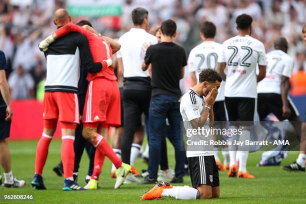 Cyrus Christie of Fulham prays at full time during the Sky Bet Championship Play Off Final between Aston Villa and Fulham at Wembley Stadium on May...