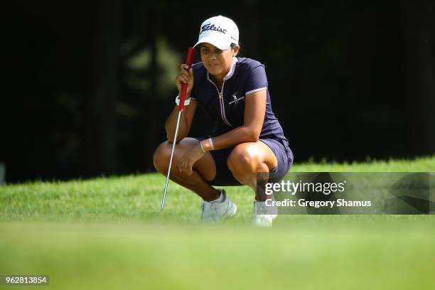 Julieta Granada of Paraguay reads a putt on the sixth green during the third round of the LPGA Volvik Championship on May 26, 2018 at Travis Pointe...