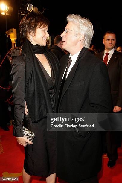 Actor Richard Gere and partner Carey Lowell attend the Goldene Kamera 2010 Award at the Axel Springer Verlag on January 30, 2010 in Berlin, Germany.