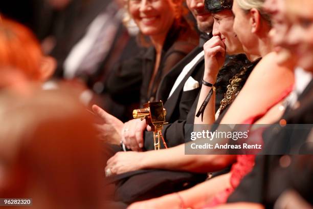 Actress Maria Kwiatkowsky sits in the audience after recieving the award 'Lilli Palmer & Curd Juergens Memorial Camera' during the Goldene Kamera...