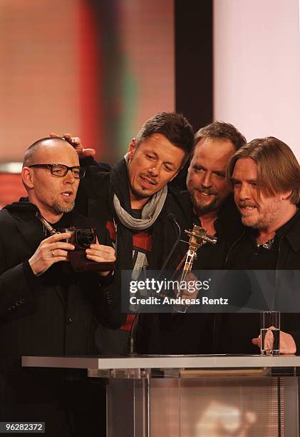 Thomas D, Michi Beck, Smudo and Andy Y receive the award for 'Best Music National' during the Goldene Kamera 2010 Award at the Axel Springer Verlag...