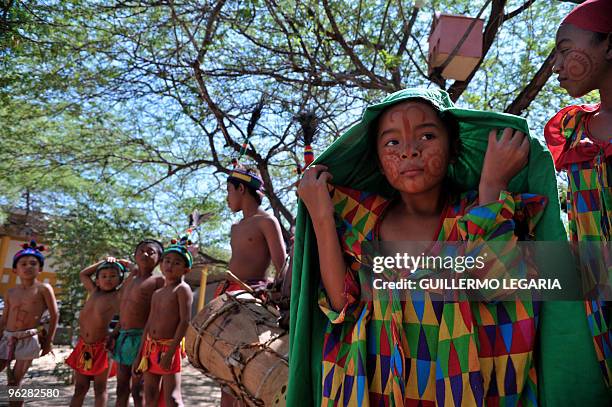Colombian Wayuu indigenous children prepare to perform during a meeting between the army and villagers of the town of Uribia, in La Guajira...