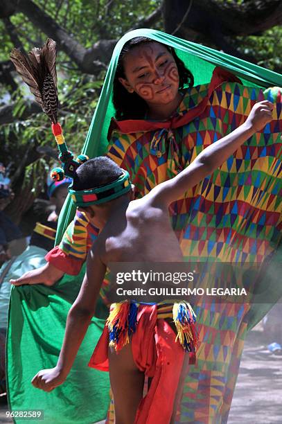 Colombian Wayuu indigenous children dance during a meeting between the army and villagers of the town of Uribia, in La Guajira Department, close to...