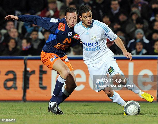 Montpellier's midfielder Jamel Saihi vies with Marseille's midfielder Hatem Ben Arfa during their French L1 football match Montpellier vs.Marseille,...