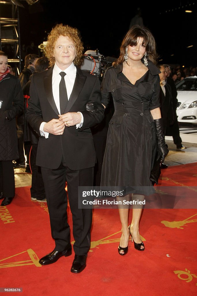 Singer Mick Hucknall and partner Gabriella Wesberry attend the... News