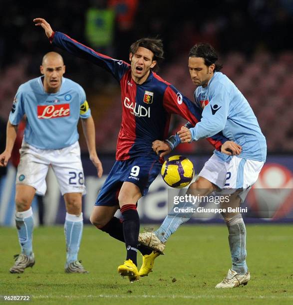 Robert Acquafresca of Genoa and Gianluca Grava of Napoli in action during the Serie A match between Napoli and Genoa at Stadio San Paolo on January...