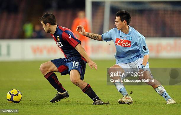 Papastathopoulos of Genoa and Marek Hamsik of Napoli in action during the Serie A match between Napoli and Genoa at Stadio San Paolo on January 30,...