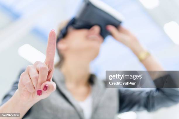 virtual reality at warehouse & manager - finger goggles stock pictures, royalty-free photos & images