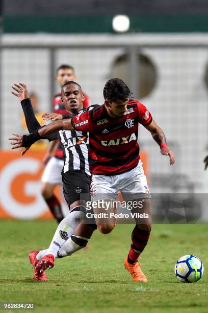Alerrandro of Atletico MG and PaquetÃ¡ #11 of Flamengo battle for the ball during a match between Atletico MG and Flamengo as part of Brasileirao...